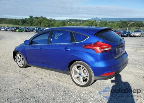 2015 Ford Focus Titanium z USA, uszkodzony, nr VIN 1FADP3N28FL254643